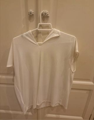 Blusa blanca arreglada