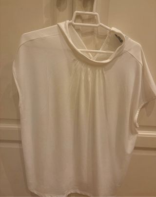 Blusa blanca arreglada