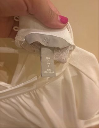 Blusa blanca arreglada