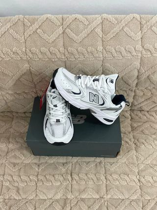 Zapatillas       530      NB      blancas talla 40