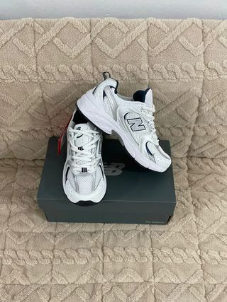 Zapatillas       530      NB      blancas talla 40