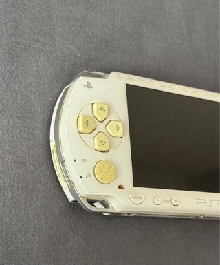 PSP Blanca + 9 Juegos y Película UMD
