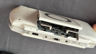 PSP Blanca + 9 Juegos y Película UMD