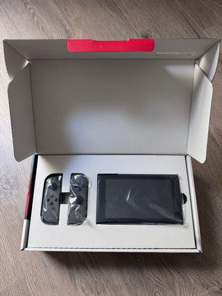 Nintendo Switch + Juego + Extras