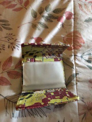 Cartera Parfois con estampado de casas