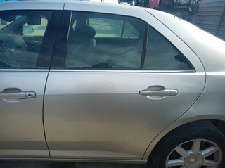 ELEVALUNAS TRASERO IZQUIERDO CADILLAC STS G/LY7 (