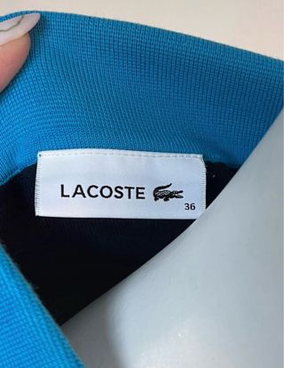Polo Lacoste Azul Marino Cuello Tricolor