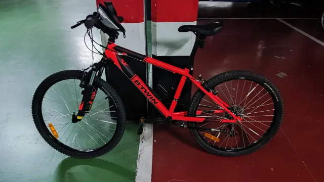 Bicicleta MTB Rockrider 500 24" naranja con extras