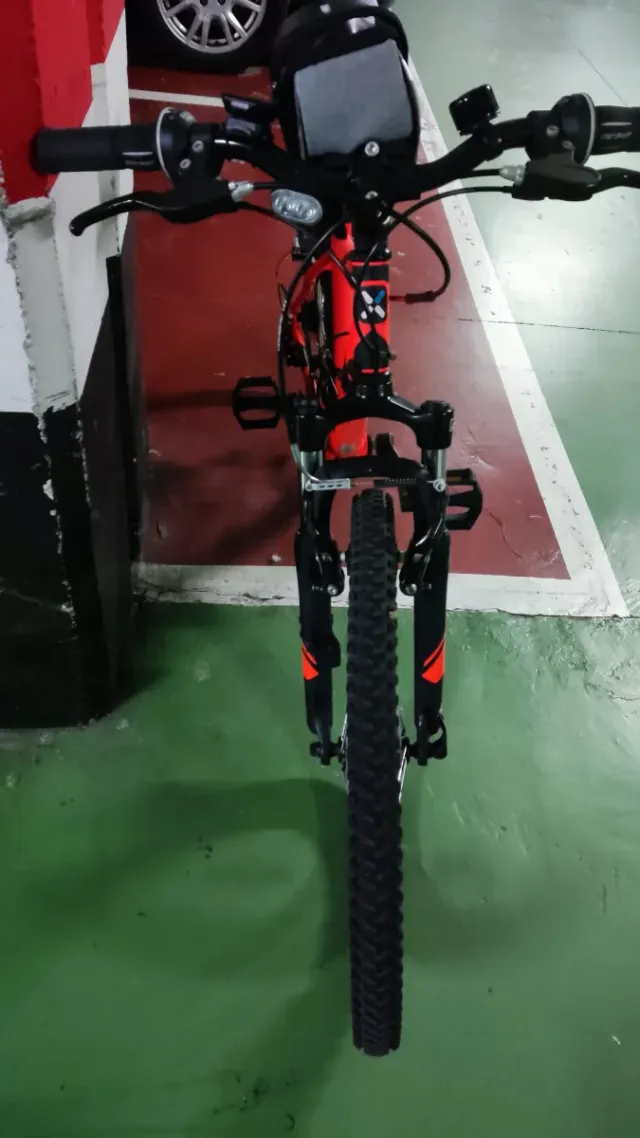 Bicicleta MTB Rockrider 500 24" naranja con extras