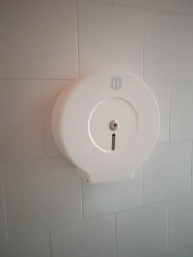 Dispensador jabón y portarrollos