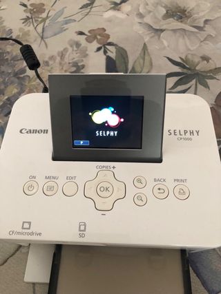 Impresora Canon Selphy CP1000 y funda CANON