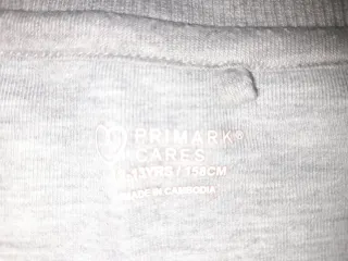 Sudadera gris y negra con logo talla 12-13
