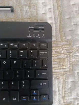 Teclado portátil para tablet con puntero