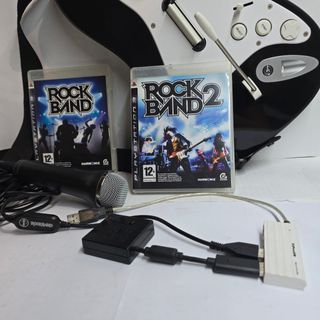 Guitarra +  Bateria + Microfono
Rockband 1 y 2 Ps3