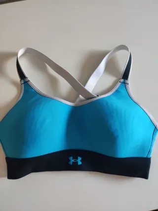 Top deportivo Under Armour azul mujer