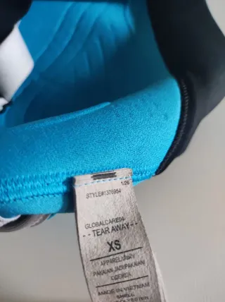 Top deportivo Under Armour azul mujer