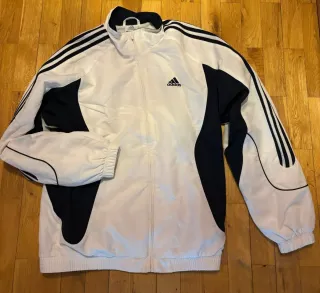 Chaqueta deportiva Adidas blanca y negra
