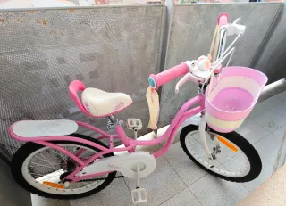 Se vende bicicleta niña rod 16 rosa + ruedines.