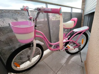 Se vende bicicleta niña rod 16 rosa + ruedines.