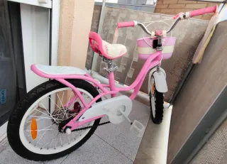Se vende bicicleta niña rod 16 rosa + ruedines.