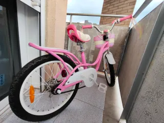 Se vende bicicleta niña rod 16 rosa + ruedines.
