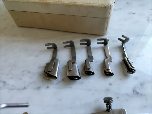 Lote prensatelas Singer antiguos