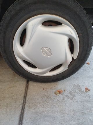 Tapacubos Nissan Micra 2000