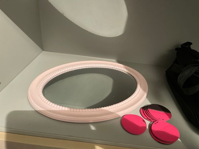 Espejo ovalado decorativo