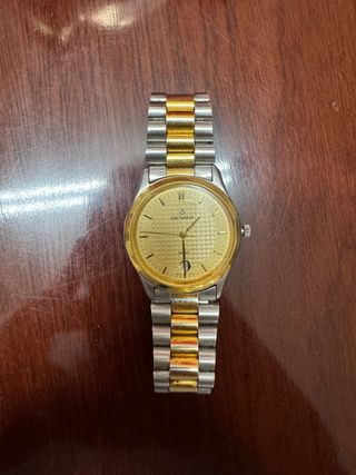 Reloj Grovana Suizo Bicolor Acero y Oro