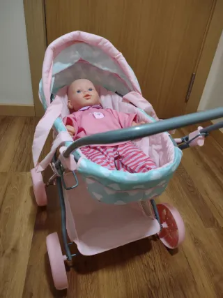 Silleta de juguete con muñeco y sonido