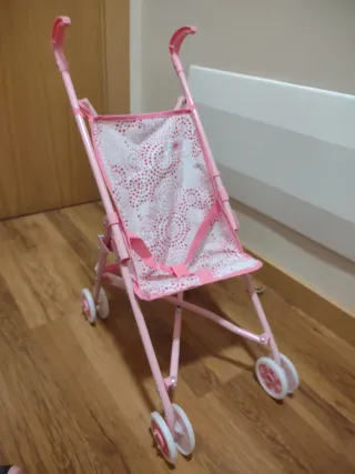 Silleta de juguete con muñeco y sonido