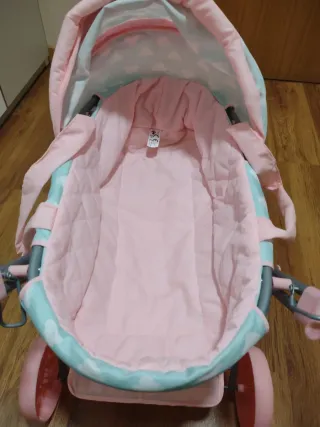 Silleta de juguete con muñeco y sonido