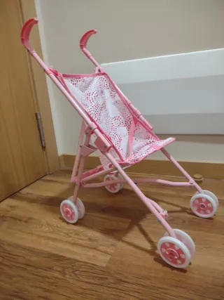 Silleta de juguete con muñeco y sonido