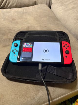 Nintendo Switch OLED con cover e accessori