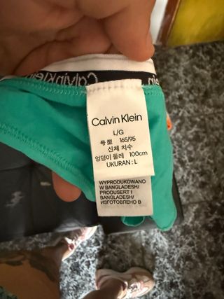 Tangas Calvin Klein Naranja y Turquesa