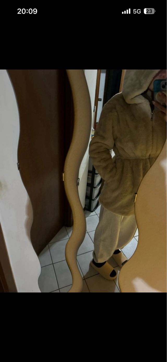 Pellicotto lungo beige con tasche