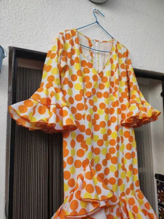Traje de flamenca con volantes. 