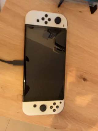 Nintendo Switch OLED White + Giochi