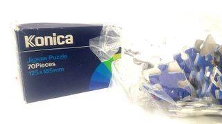 Puzzle Konica 70 piezas 125x185mm