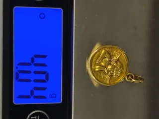 Medalla oro 18 kilates.