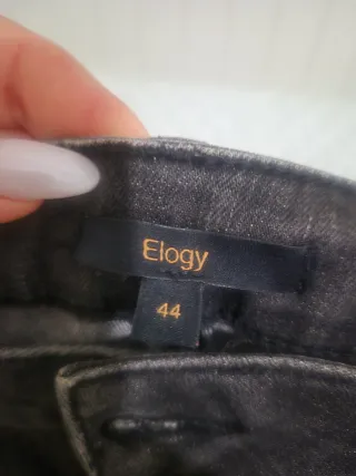 Pantalón vaquero gris/negro con pedrería