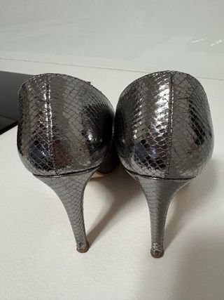 Decoltè donna effetto pitone