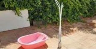 Bañera bebé rosa con soporte plegable