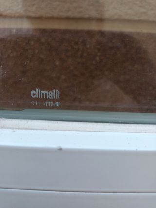 Puerta de aluminio con cristal climalit