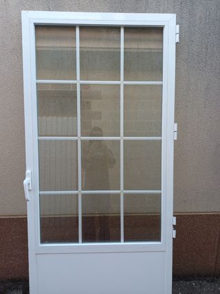 Puerta de aluminio con cristal climalit