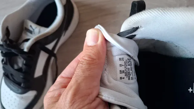 Zapatillas Puma niño negras y blancas