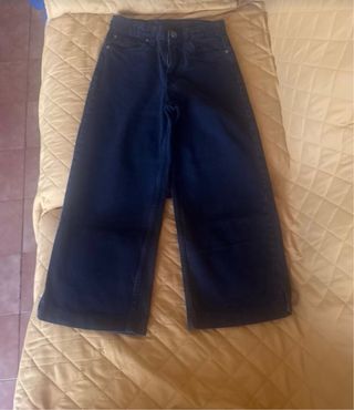 Jeans bambina con strappi e stampe