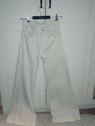 Pantalones Sfera anchos tiro medio blancos
