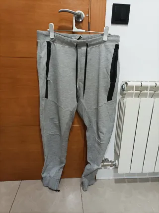 Pantalones de chándal grises con cremalleras