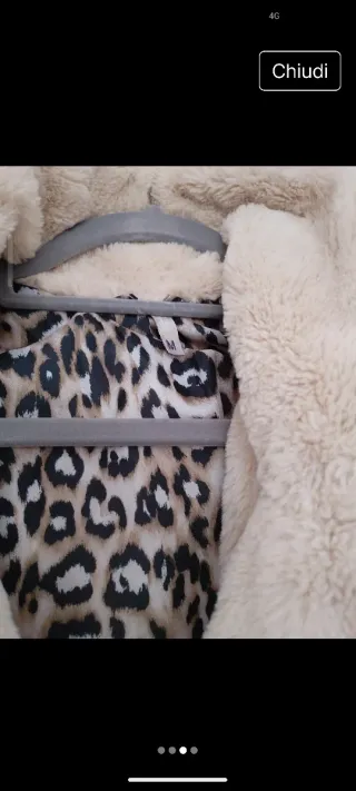 Cappotto in peluche color panna. Veste da M a XL.